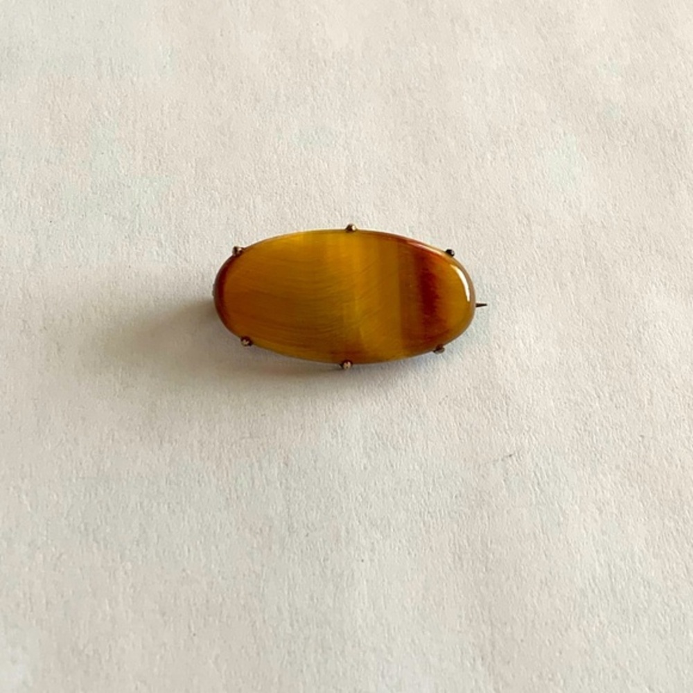 Antique cats eye/agate brooch